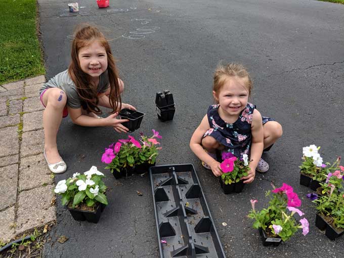 Kids Planting Flowers