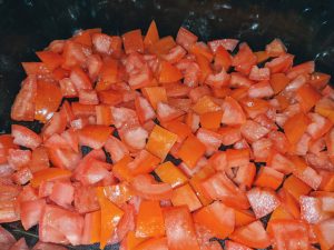Diced Tomatoes in Glass Pan on Oven