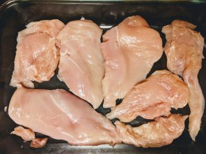 Raw Chicken Breast Sliced Thin