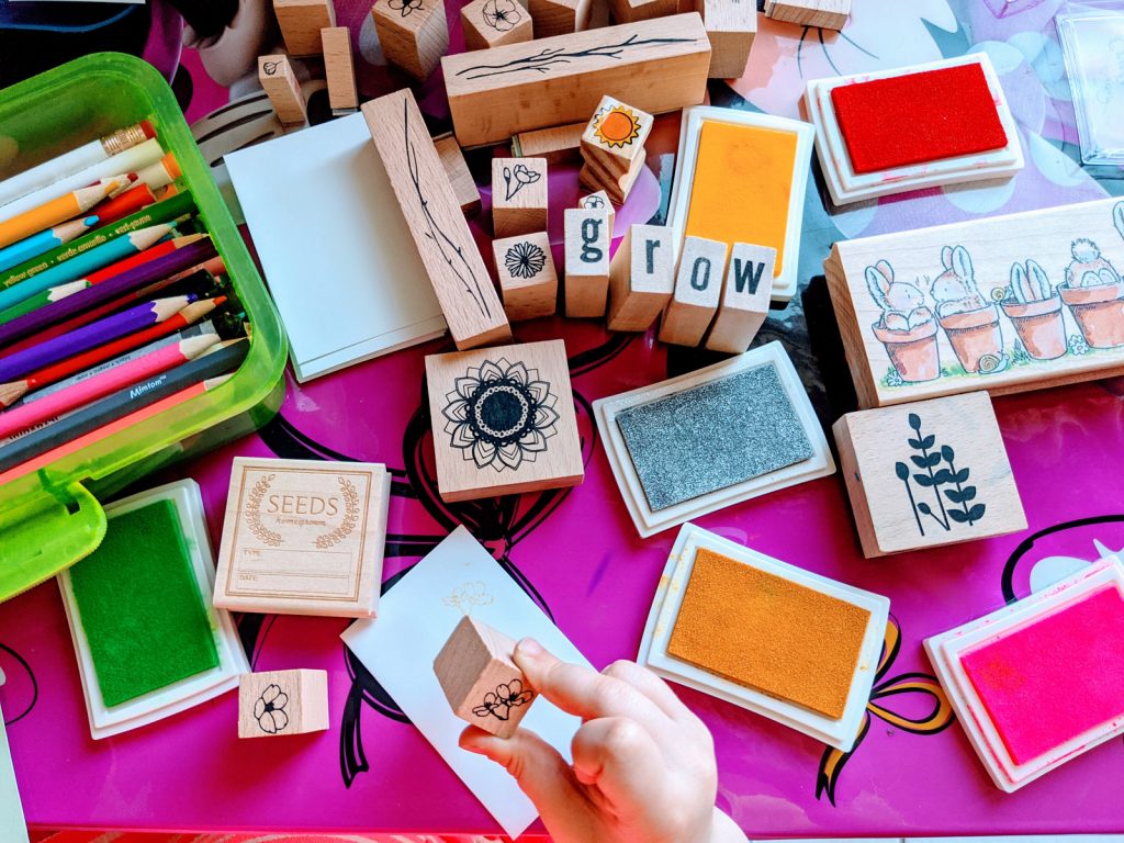 DIY Seed Envelopes made with Garden Crafting Tools like Wooden Stampers and fancy ink pads