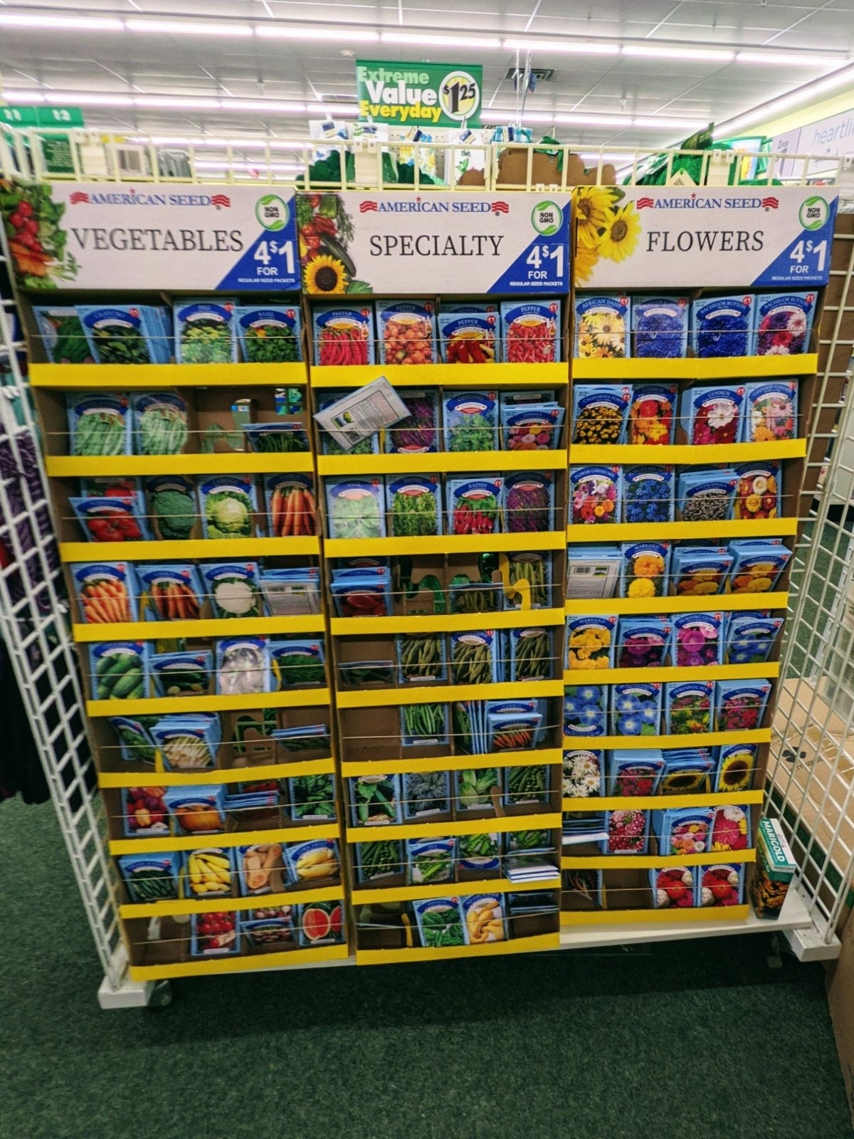 Rack of vegetable seeds, flowers, fruit, and herbs at Dollar Tree in February 2022