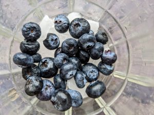 Glass of Crushed Ice with Fresh Blueberries