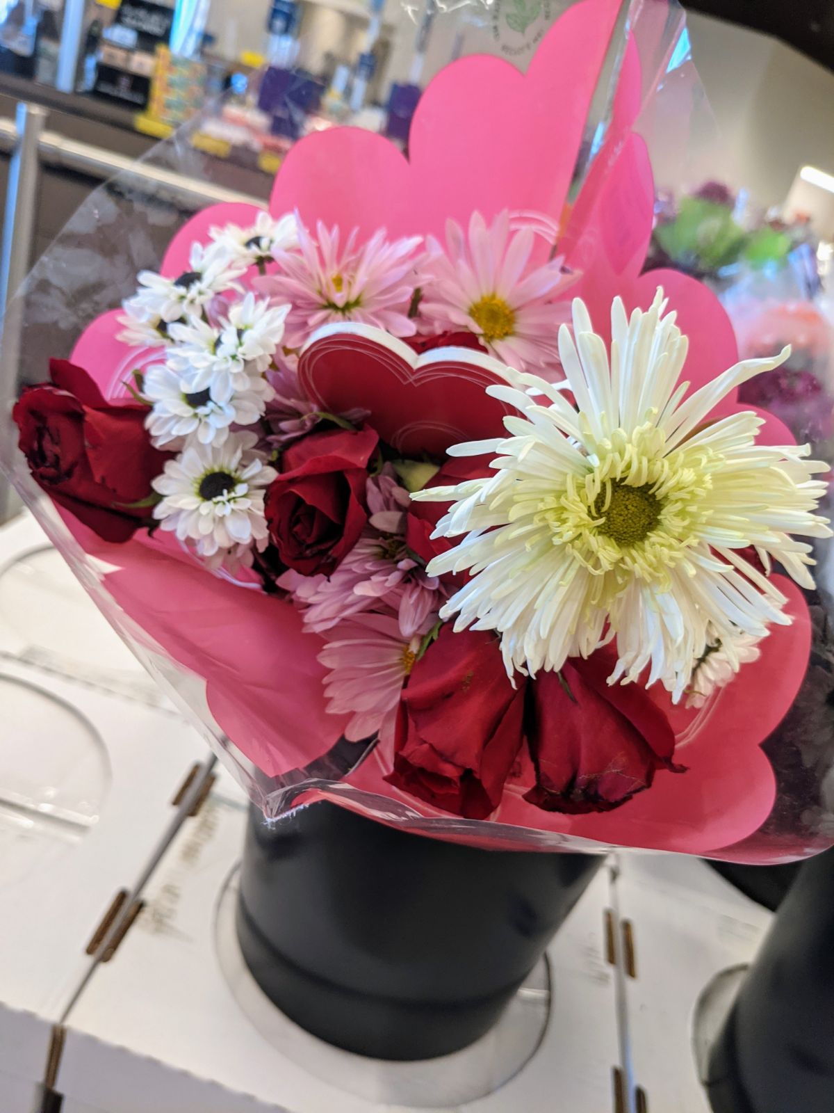 Red and white Valentine's Day flower arrangement at Aldi