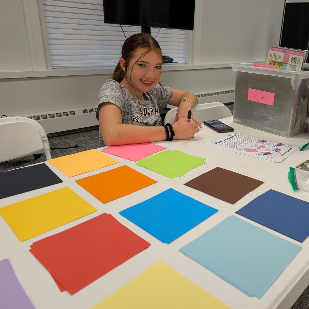 Origami paper ready for seed envelope workshop