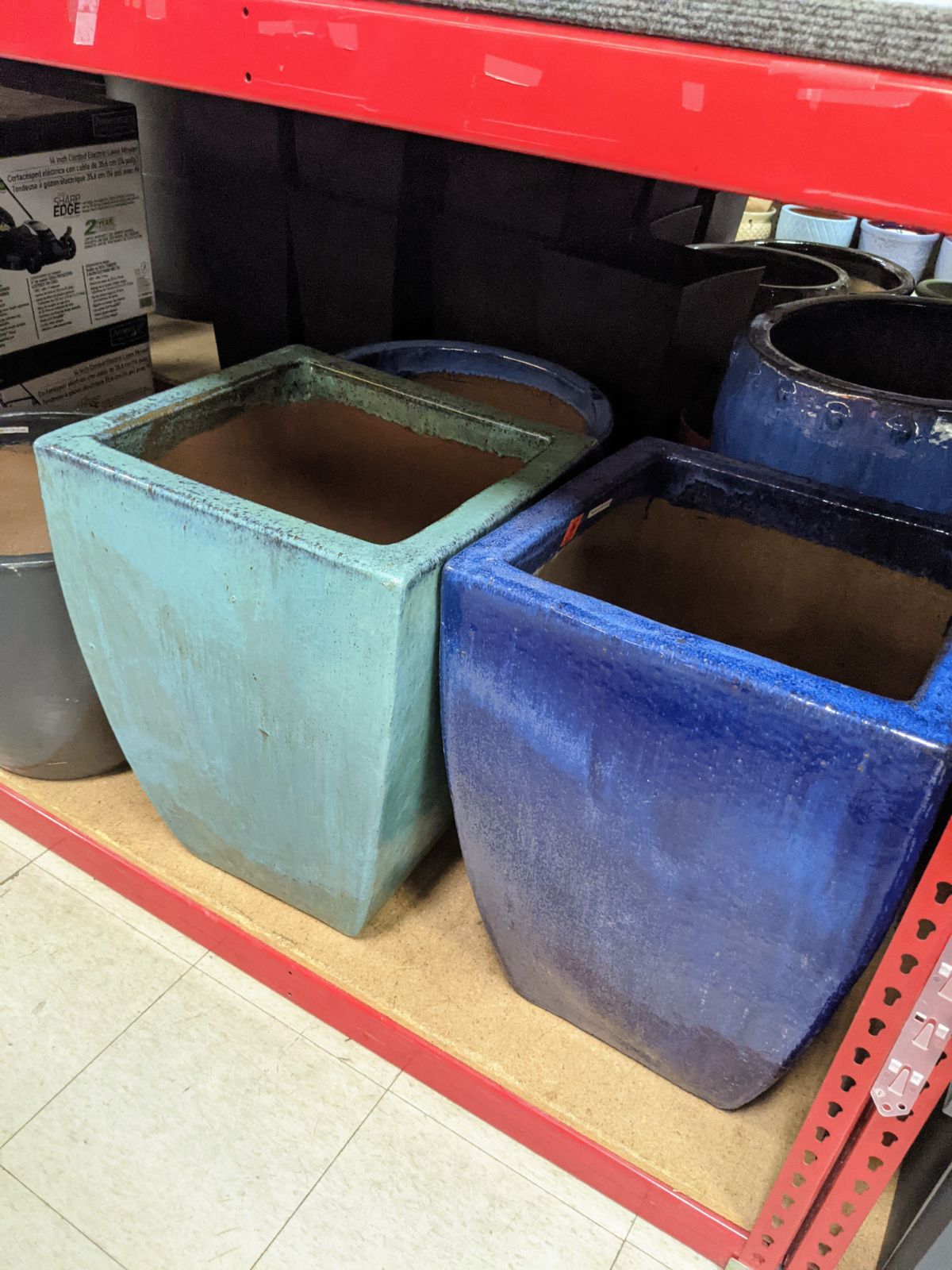 Ceramic / pottery planters in shades of blue at Ollies