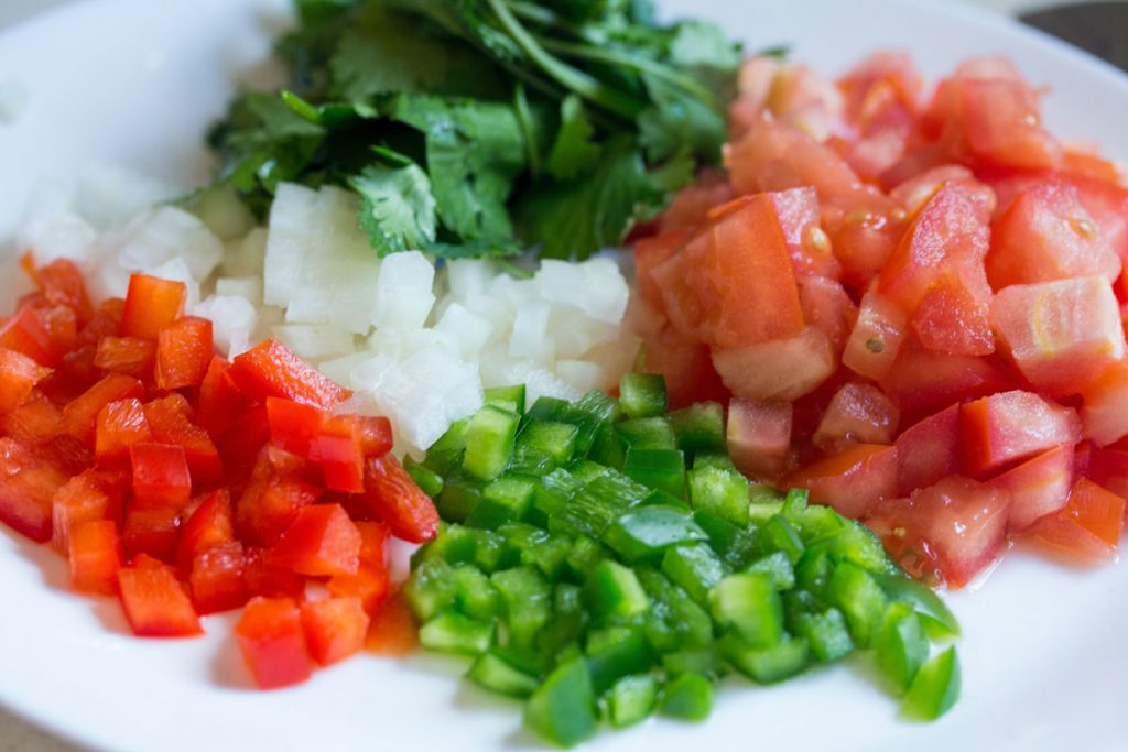 Cilantro salsa substitute ideas  - cilantro ingredients with tomatoes, peppers, and onions