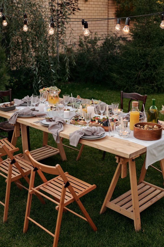 Outdoor Garden Party Table and Chairs with Food and Place Settings - Photo by Askar Abayev from Pexels