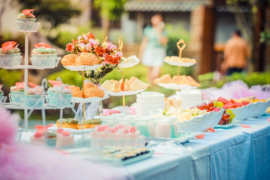 Outdoor Garden Party Table Setting with Food in Bright Colors - Photo by fu zhichao from Pexels