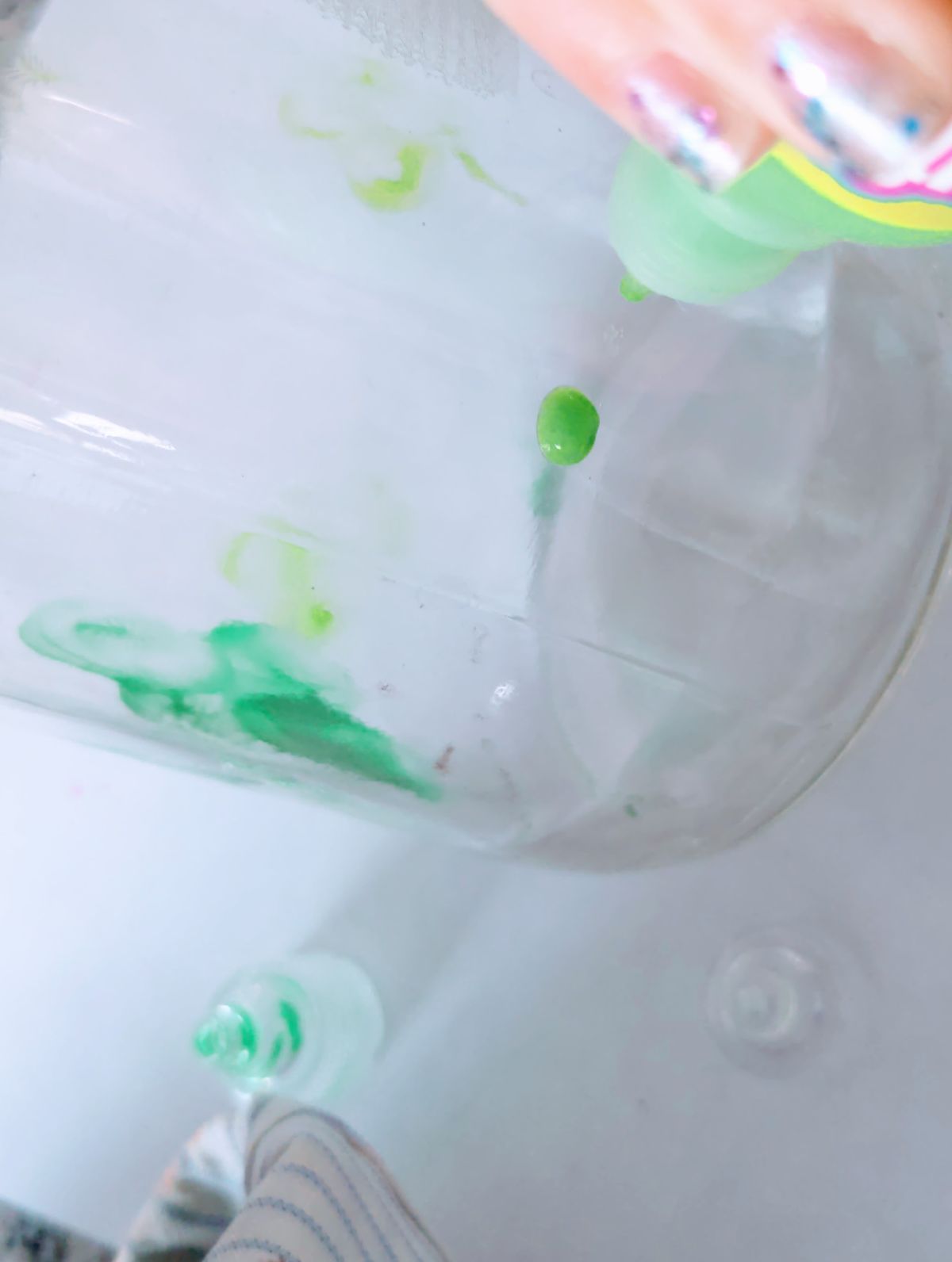 Green puffy paint on clear glass jar