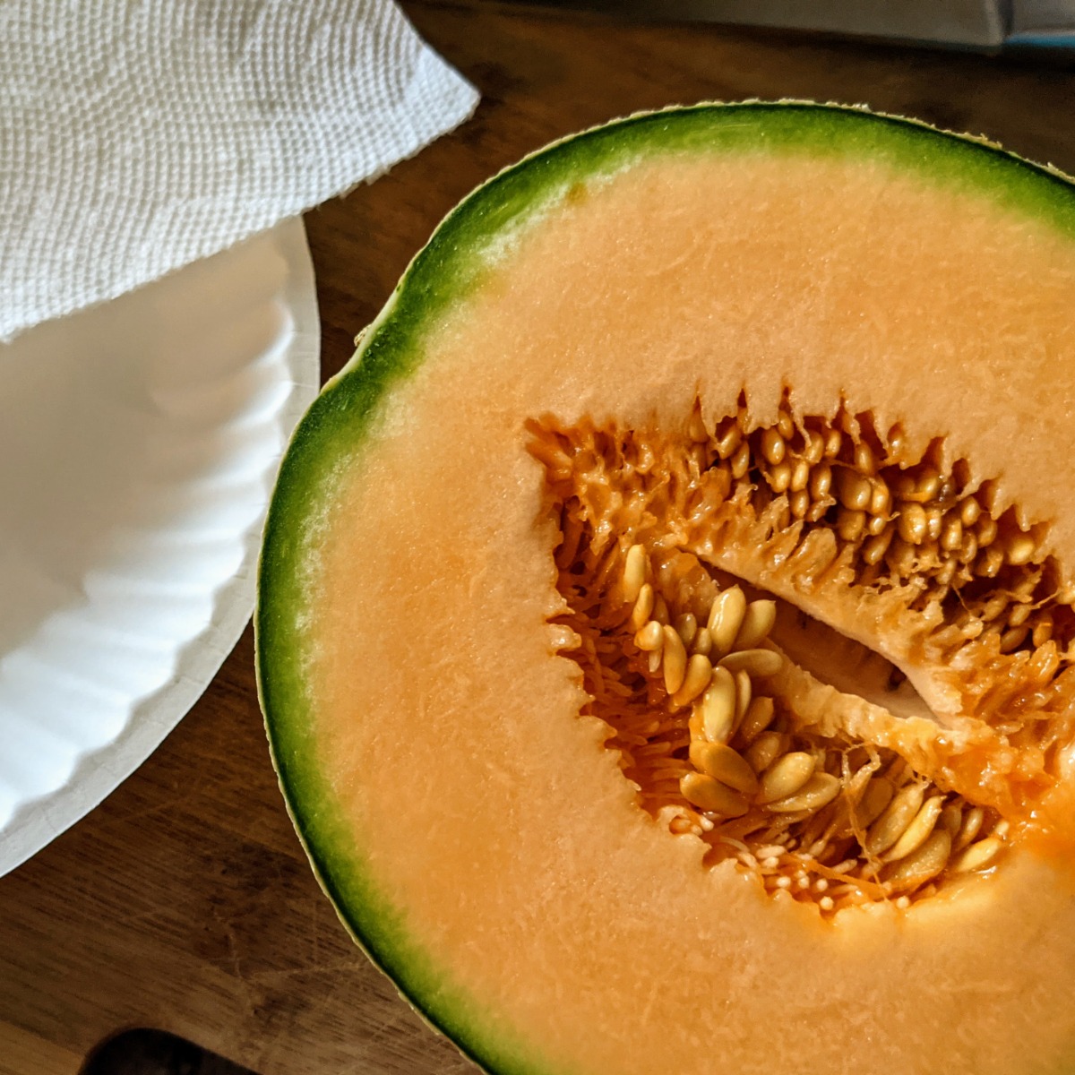 Learning how to save cantaloupe seeds is easy - first halve the cantaloupe.