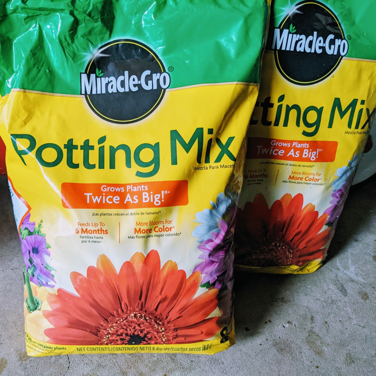 Two bags of Miracle Gro Potting Soil Mix