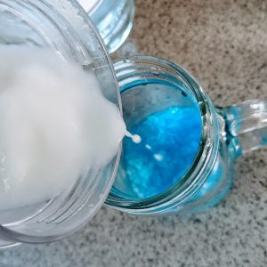 Making a Blue and White Layered Drink with Pina Colada