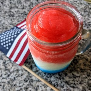 Red white and blue frozen drink with flag
