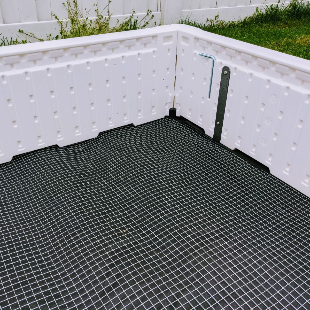 Weed matting and hardware cloth barrier for garden box