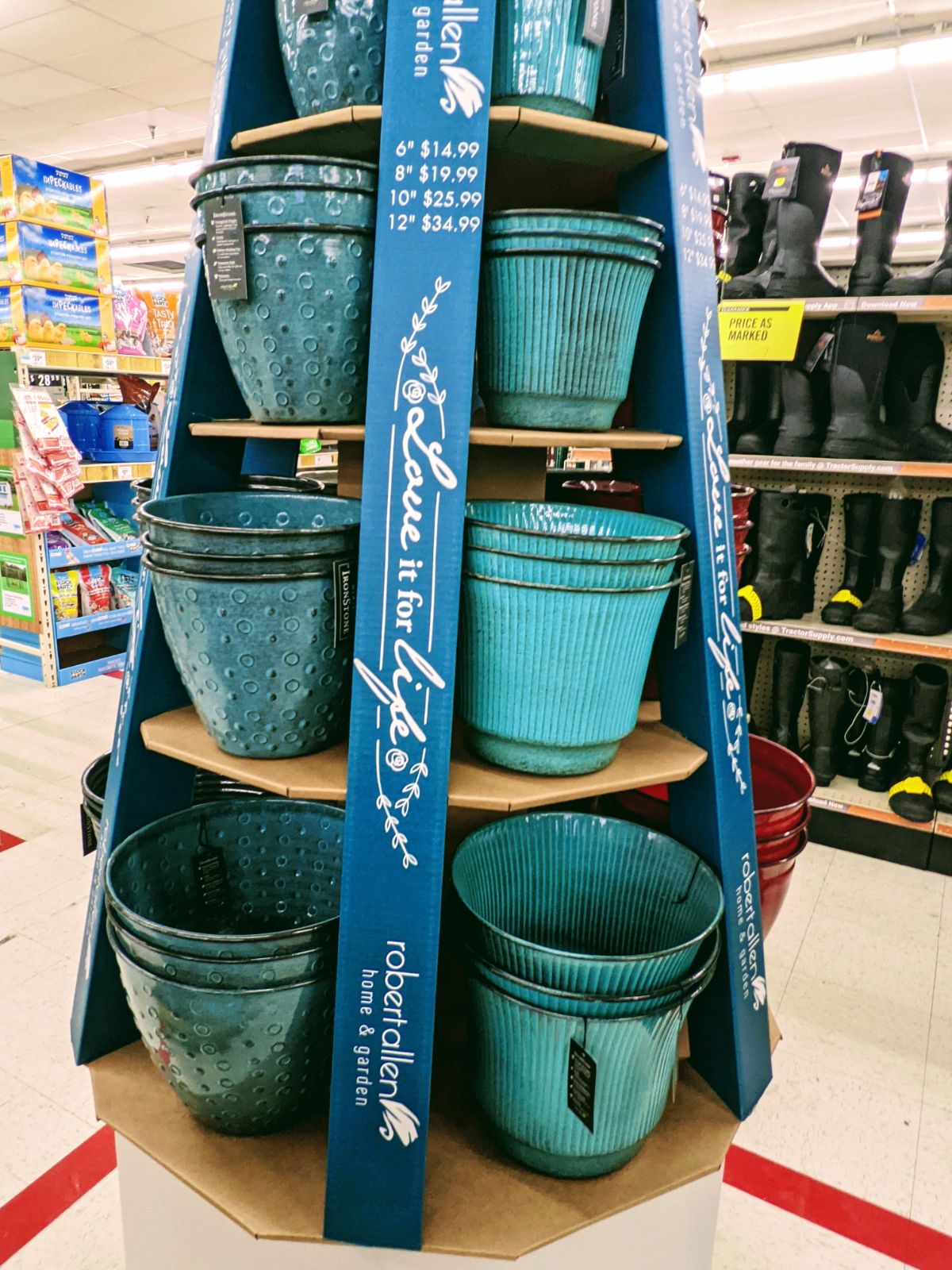 Flower pot tower with glazed ceramic pots in aqua colors