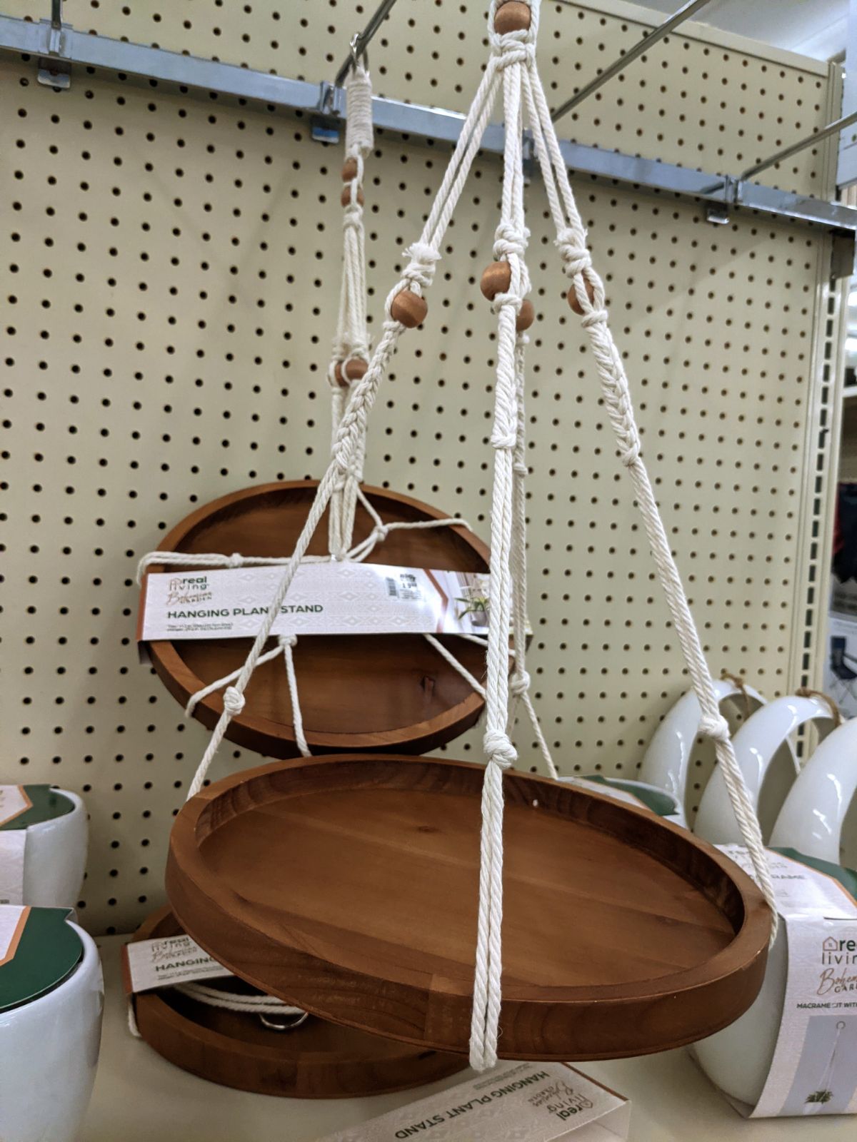 Wooden and string hanging plant stands at Big Lots offer a fun and free-spirited Boho vibe.