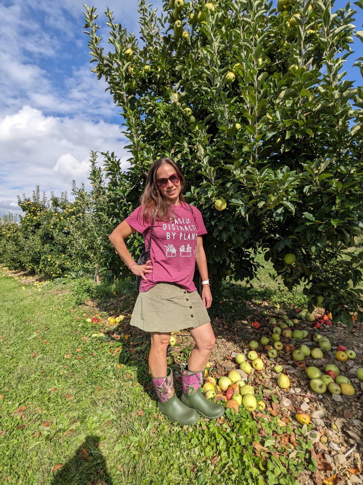 Kate Van Druff apple picking in boots